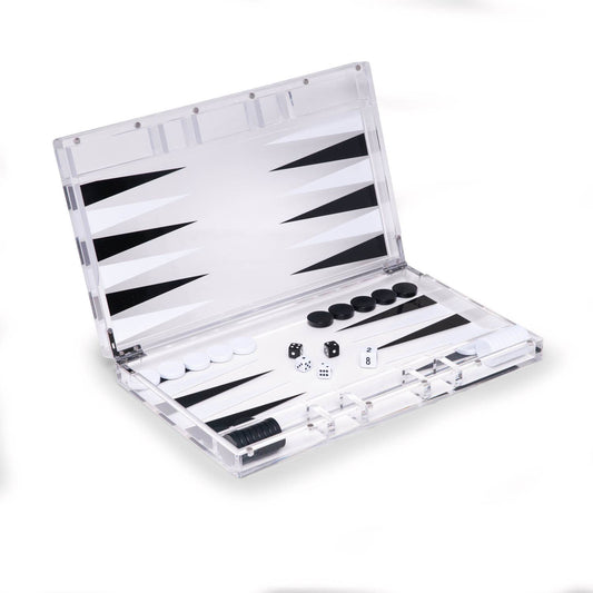 Clear acrylic backgammon set open at an angle with checkers, dice, and doubling cube