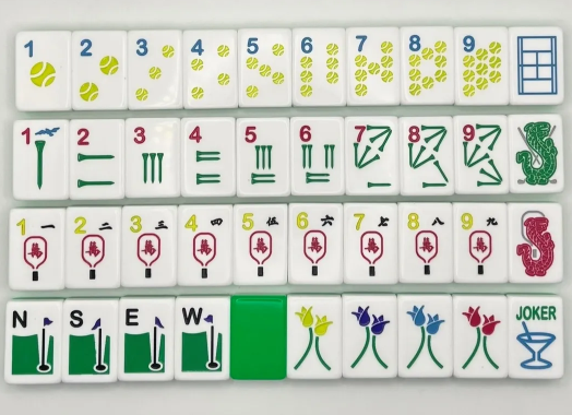 Complete mahjong tile set arranged in four rows, including a JOKER cocktail-glass tile