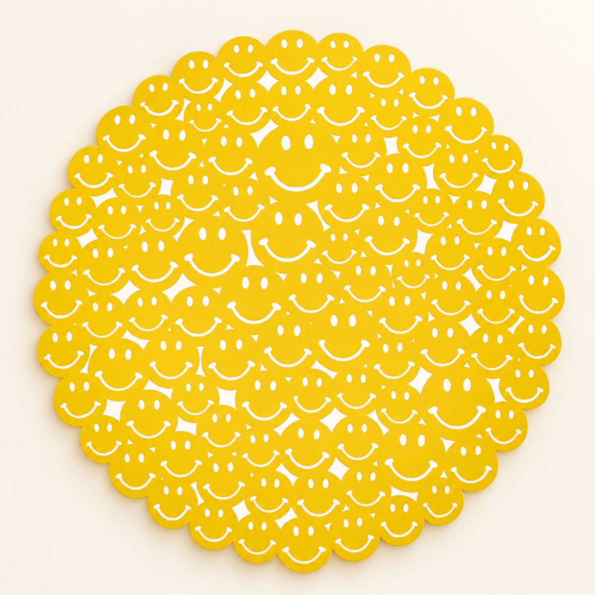 Golden-yellow medallion made of small smiley faces on white background