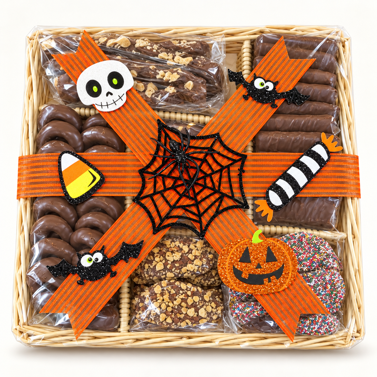 Halloween candy gift basket with chocolate, candy, and orange-and-black ribbon