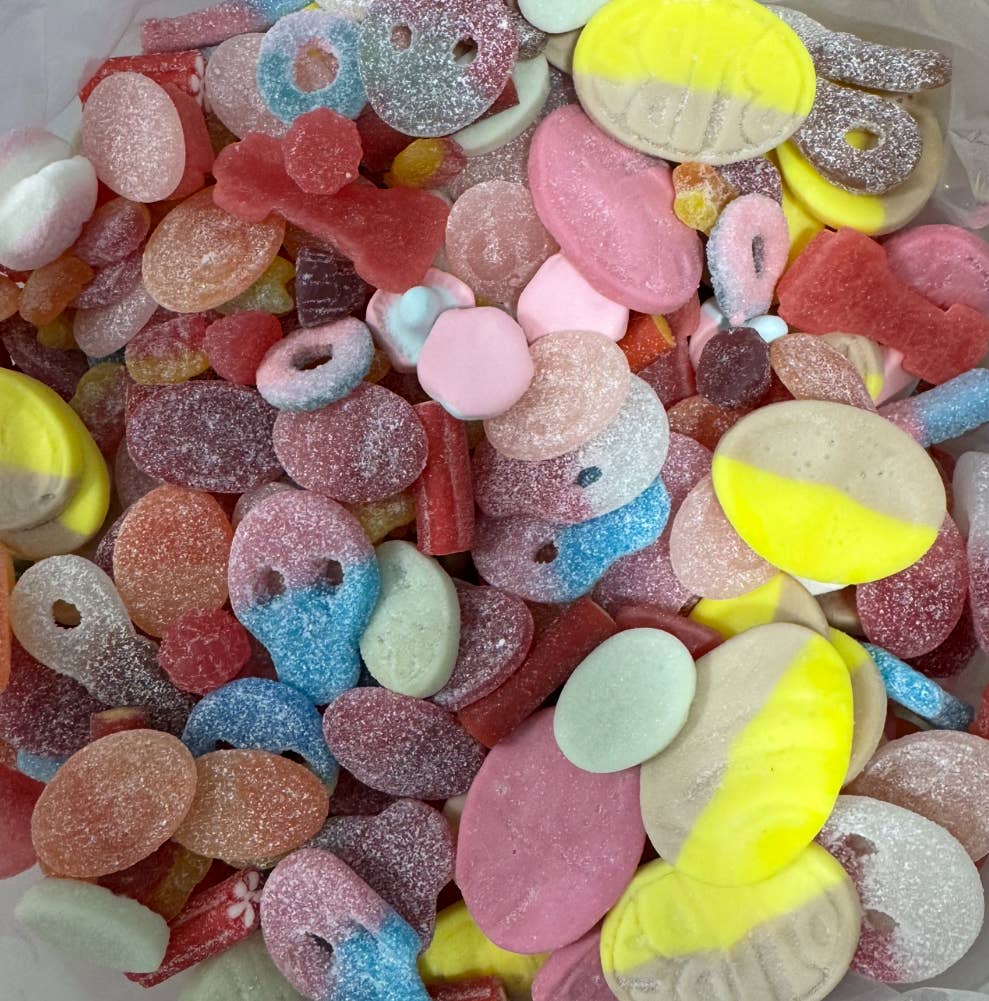 Overhead view of mixed pile of sugar-dusted Swedish candies
